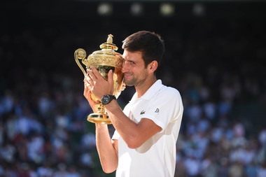 Novak Djokovic lift the Wimbledon 2018 trophy.